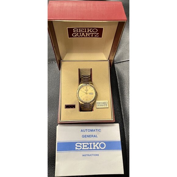 Working 1980's Vintage Seiko sq 100 gold mens watch w date + Case + Instructions